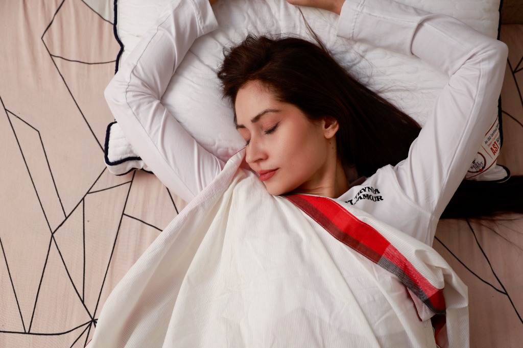 Person sleeping on a comfortable pillow